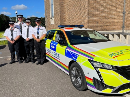 Herts officers with the pride car at County Hall in Hertfordshire