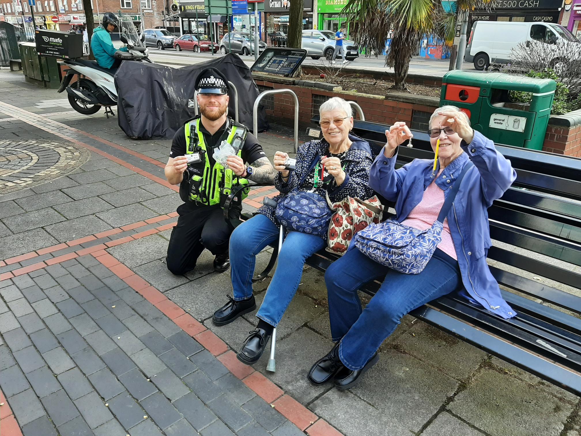 Image of officer with members of the public