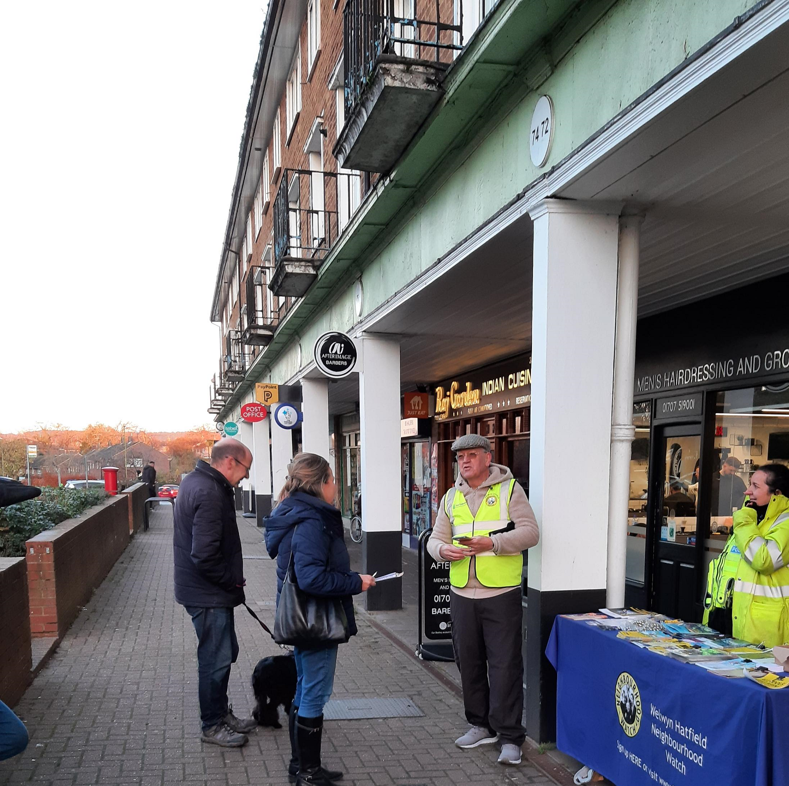 Officers standing at their stall