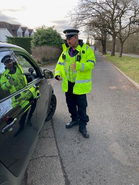 Officer talking to driver