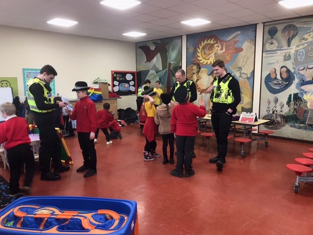children talking to officers