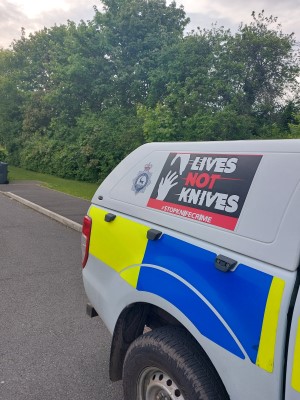 Police vehicle with Lives not Knives logo
