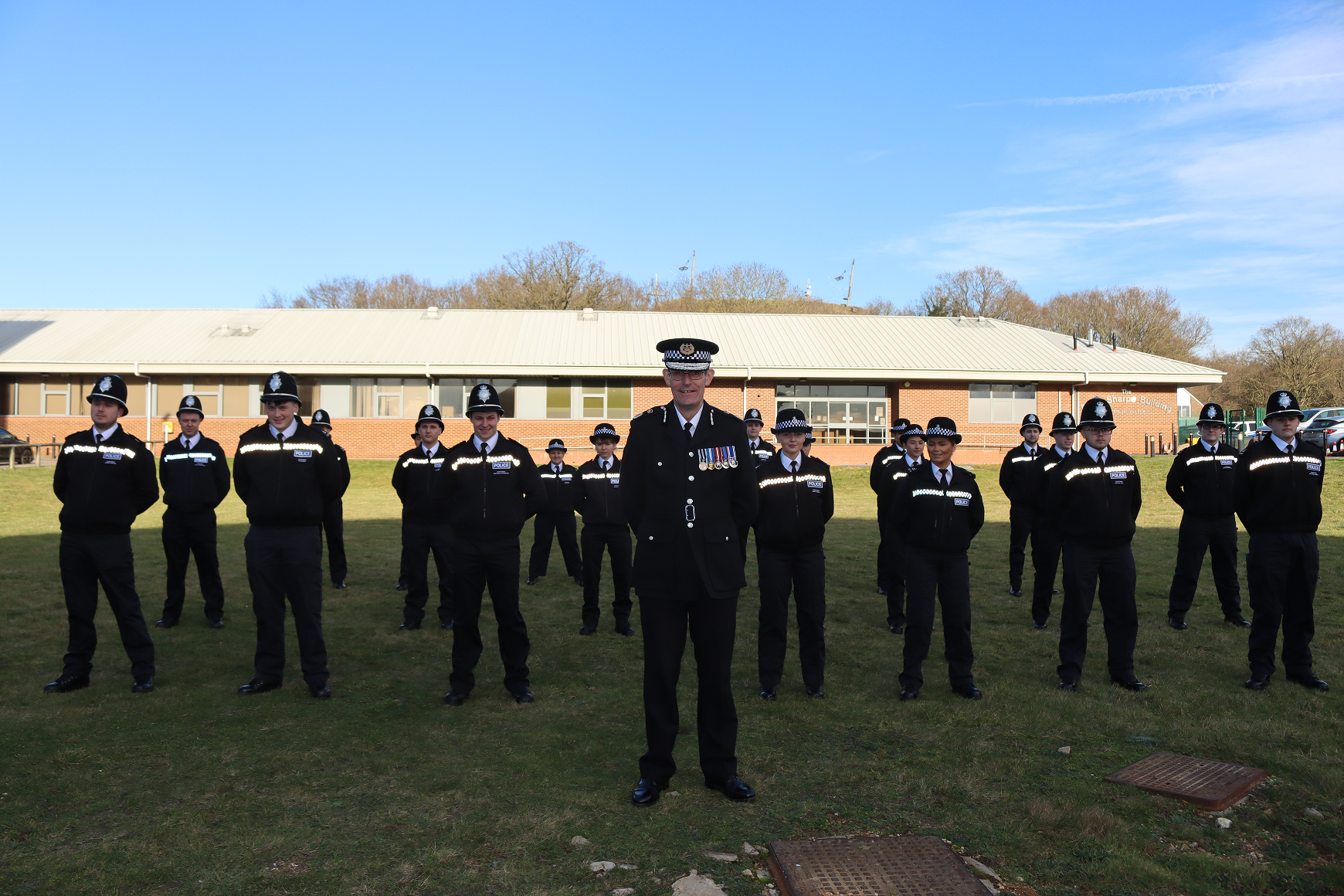 Charlie Hall with newly graduated officers