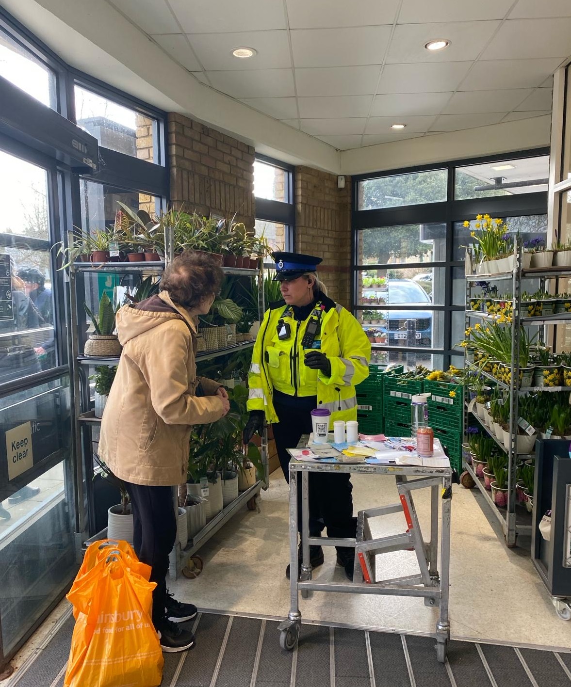 Image of PCSO talking to member of the public
