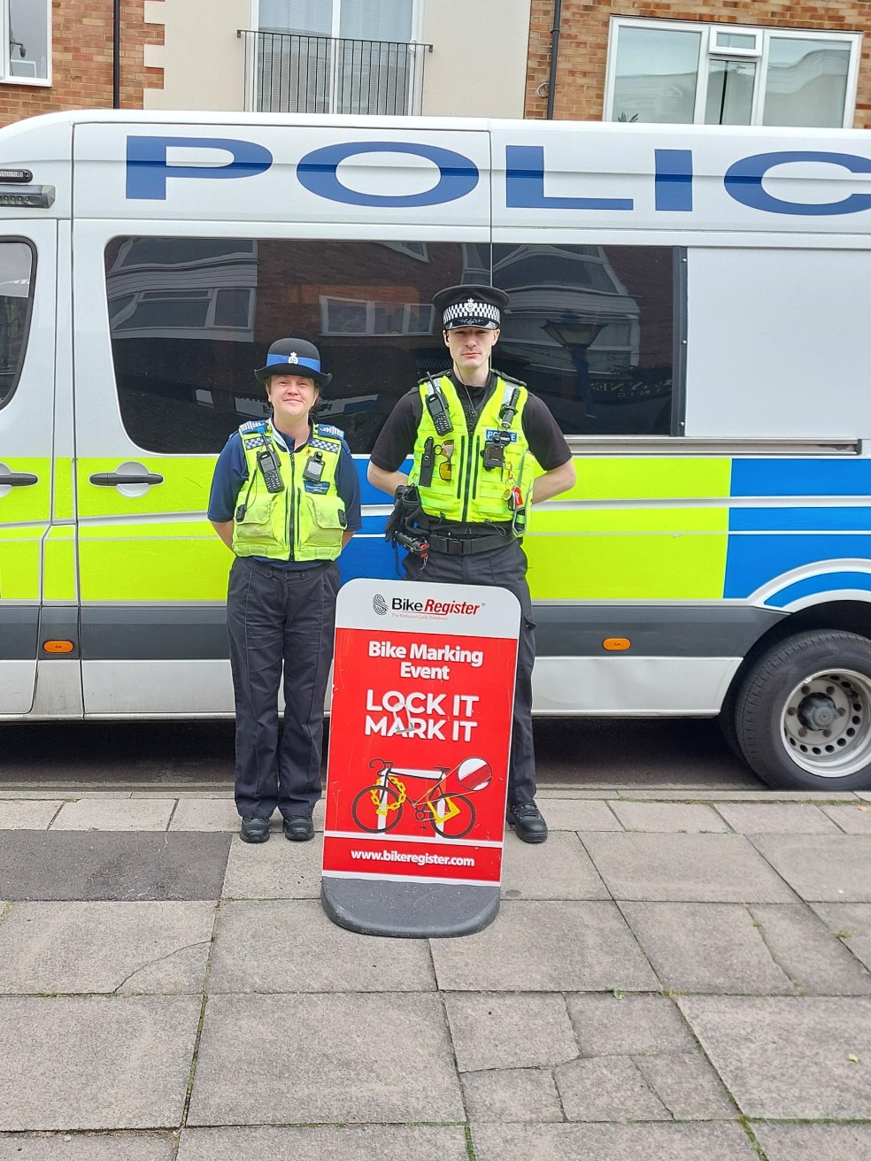Officers with police van 